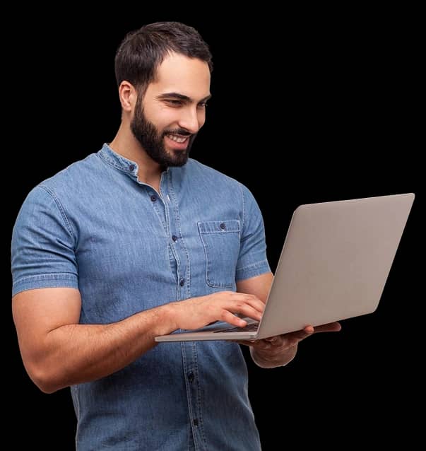 Person smiling and holding a laptop